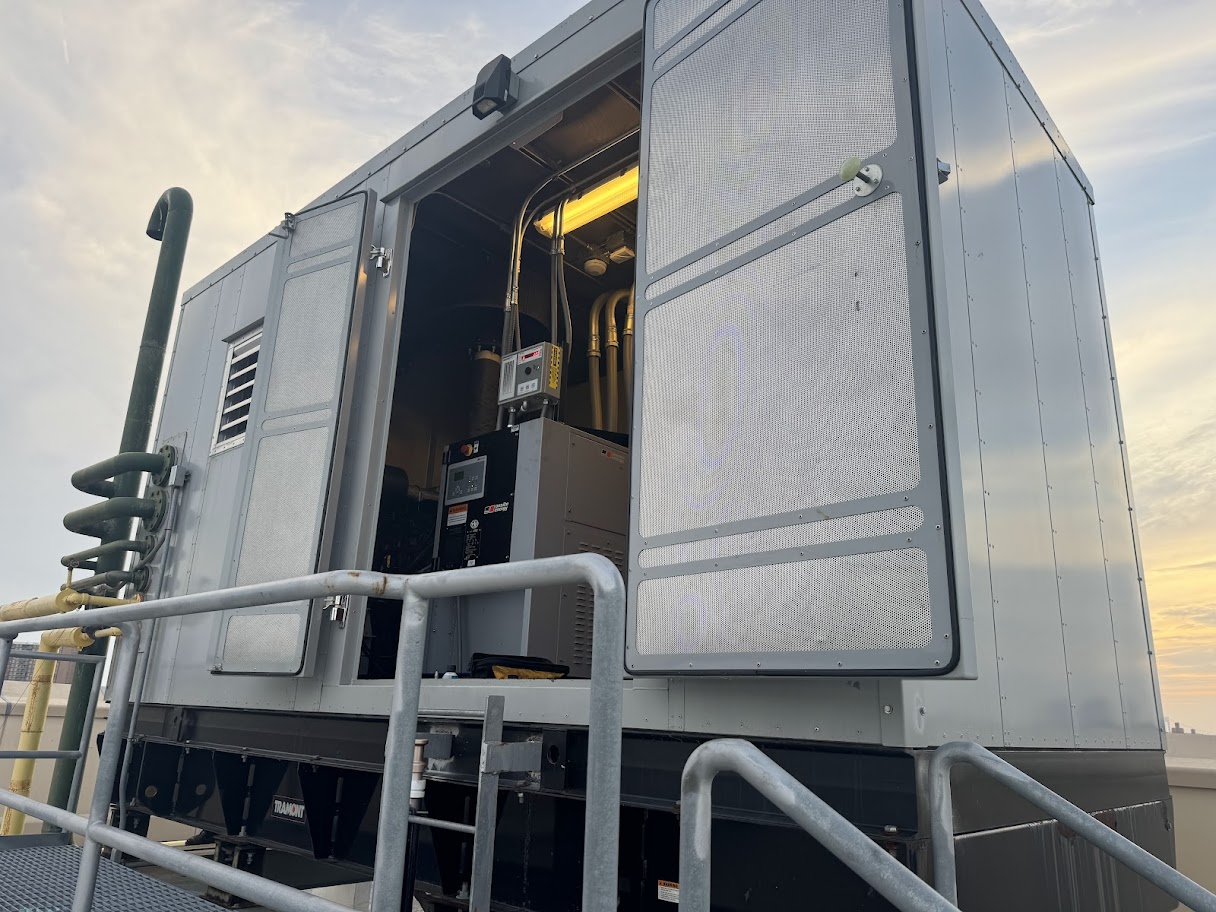 Technician repairing commercial generator