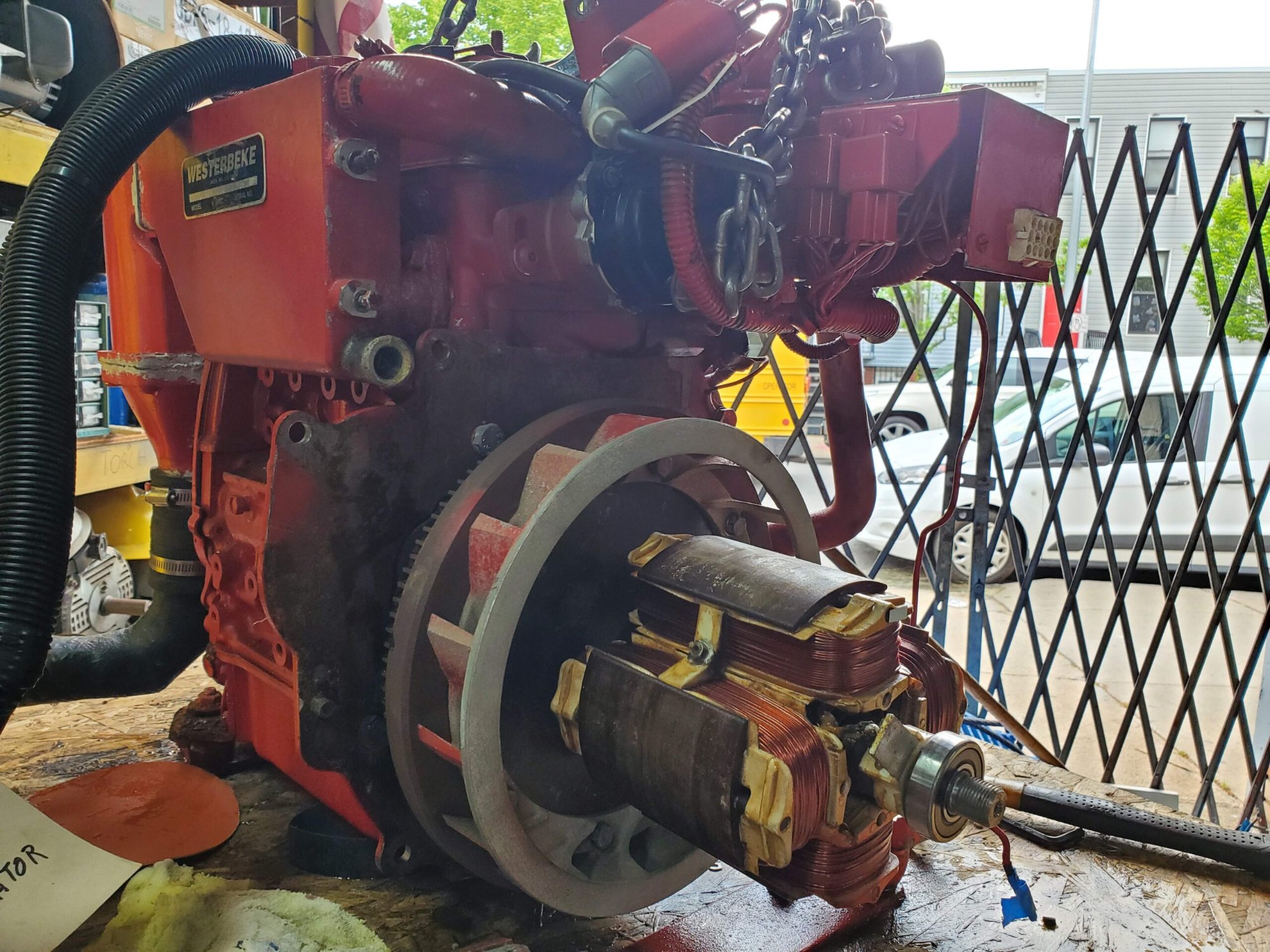 Generator technician servicing industrial unit
