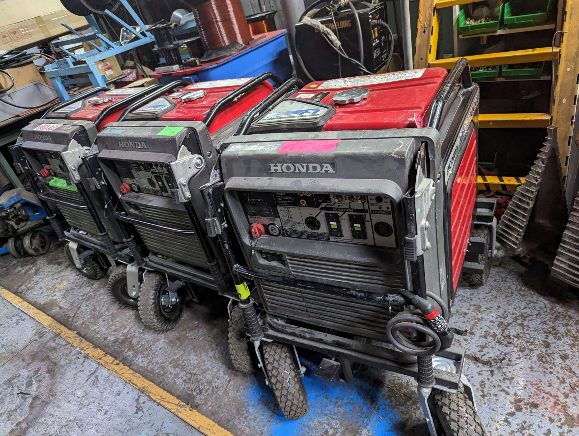 Honda EU7000is portable generators in shop